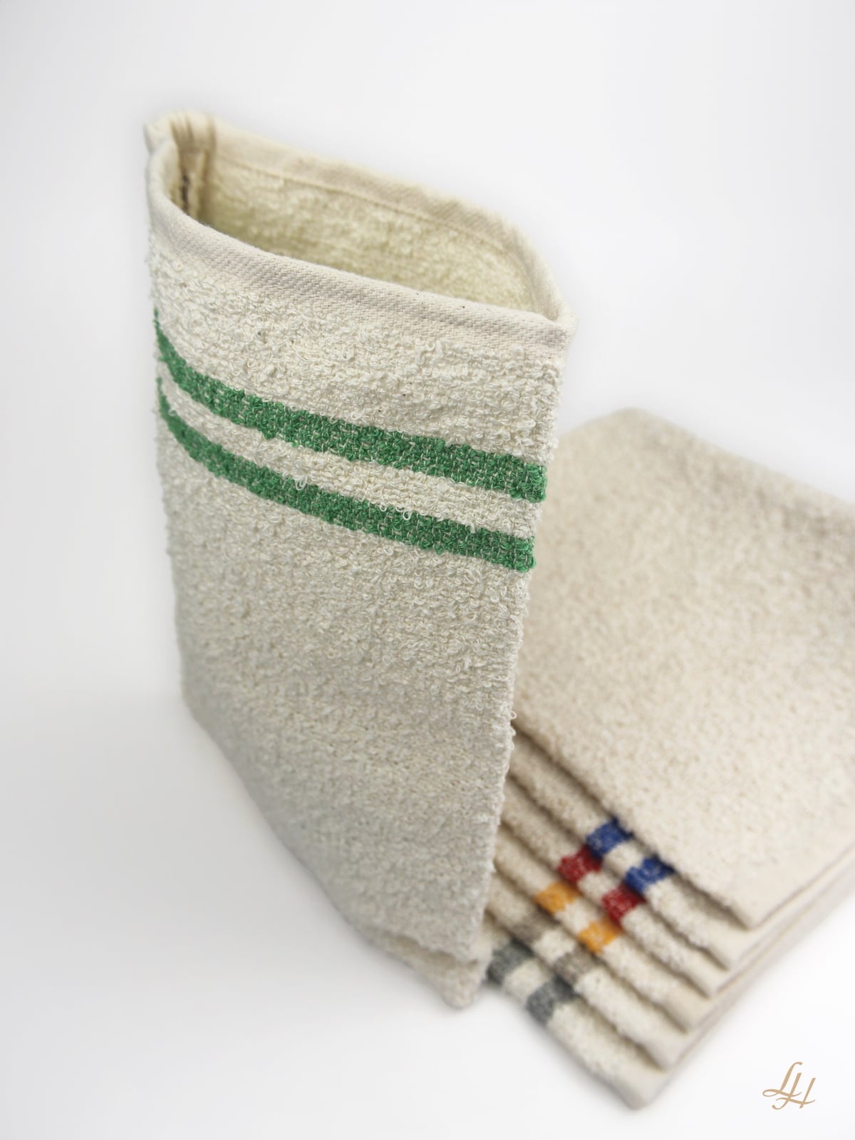 Waschhandschuh aus Leinenfrotté mit Grund Creme in Grün